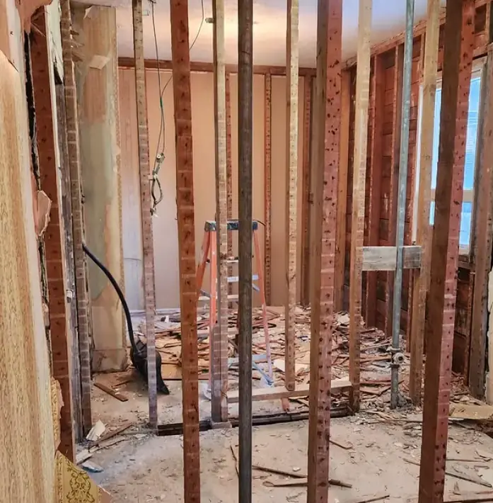 Demolition equipment clearing space for new landscape installation