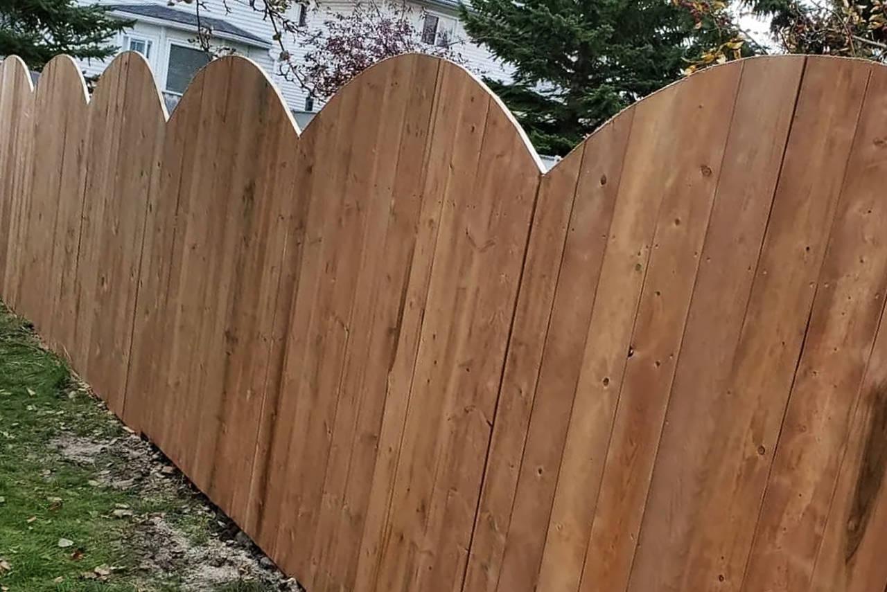 Premium privacy fence with decorative post caps and consistent finish