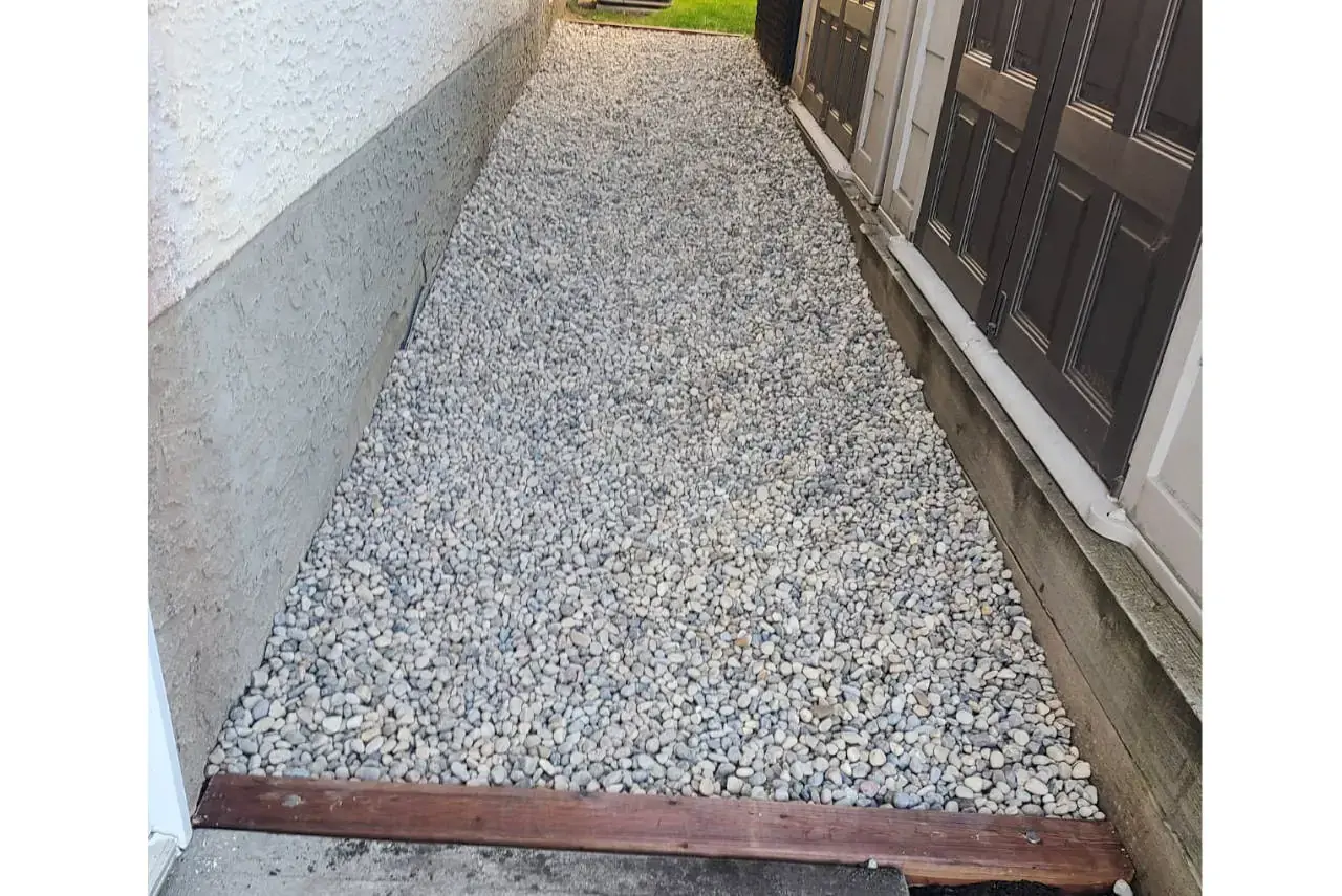 Natural stone patio blending seamlessly with surrounding garden