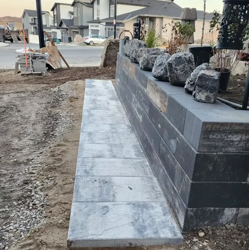 Multi-level stone patio with steps integrating with surrounding landscape